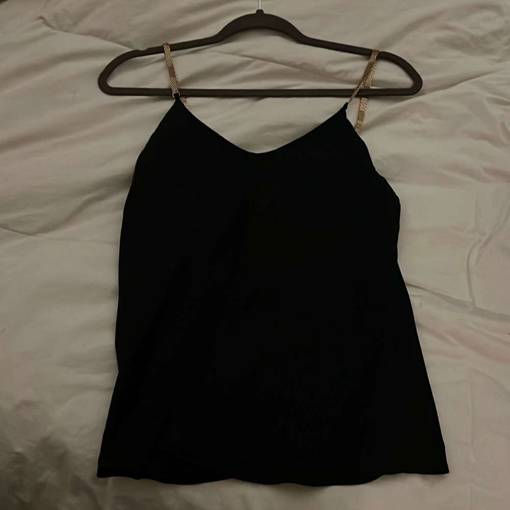 Express black and gold tank